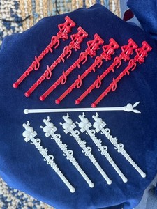 12 piece collection vintage bar swizzle sticks including Playboy and Poodle Room