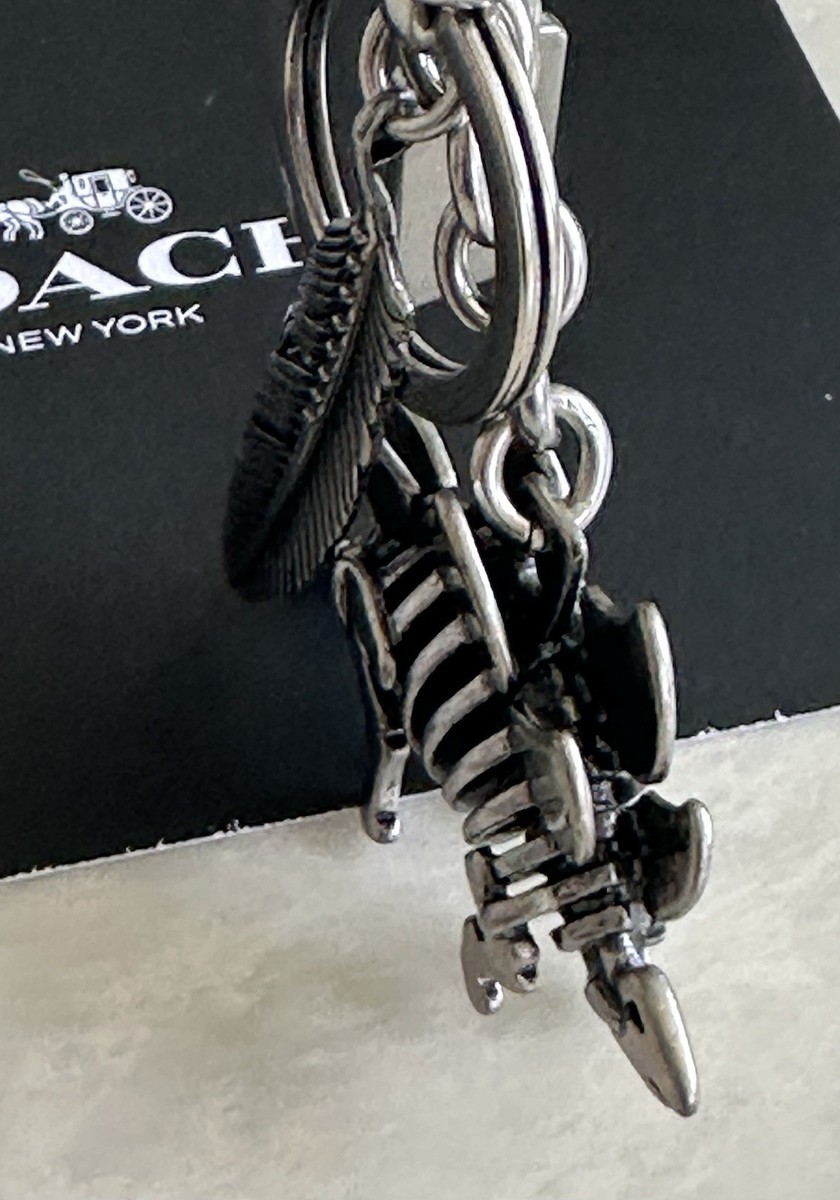タンザナイトコッパーチャームセット　コンポジット　C-850 COACH STEGGY STEGOSAURUS & FEATHER NICKEL BAG CHARM KEYRING 65134
