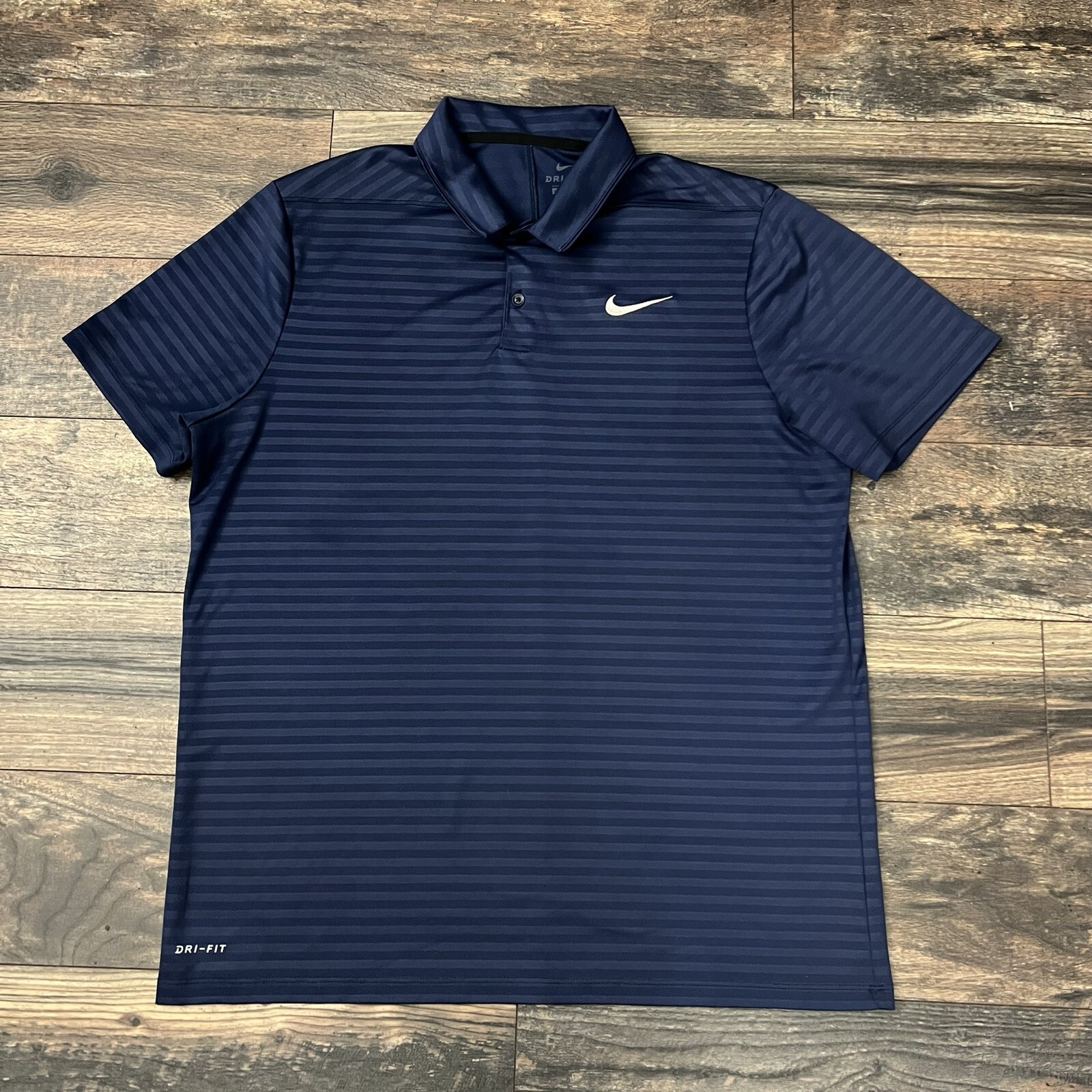 navy blue nike golf shirt