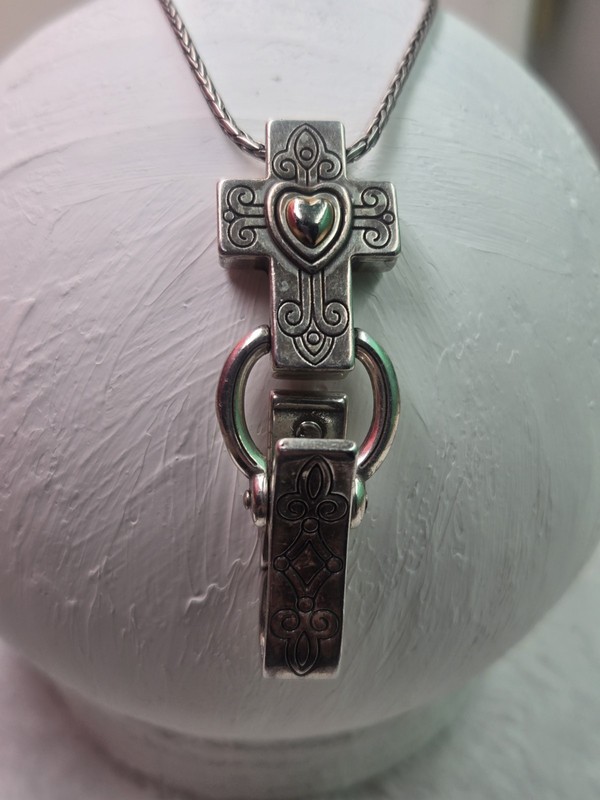 2This is a Brighton cross pendant and chain lanyard, often used as an ID badge