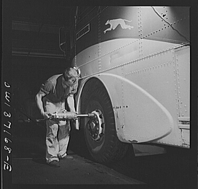 #ad #ad Pennsylvania. Removing a tire from a bus at the Greyhound garage Pittsburgh $9.99
