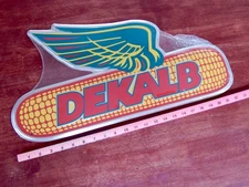 DEKALB Flying Corn Cob Metal Farm Sign 23 X 12 Embossed ~ NEW