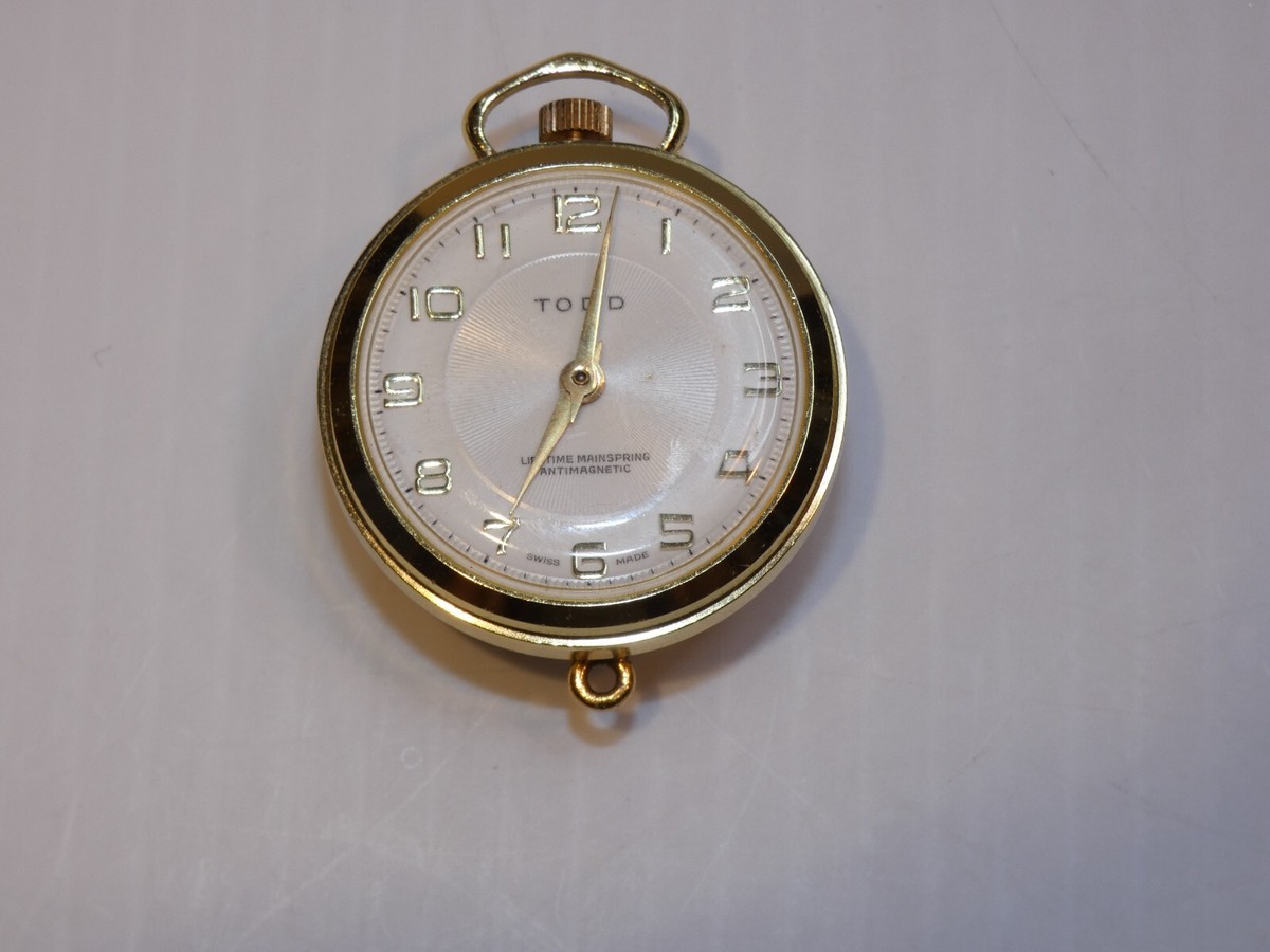Vintage Todd Swiss Pendant Watch, Gold Tone, Green Pierced Vintage Todd Swiss Pendant Watch, Gold Tone, Green Pierced