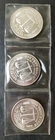 Lot of Three 1986 1oz Silver World Trade Unit Rounds in Plastic