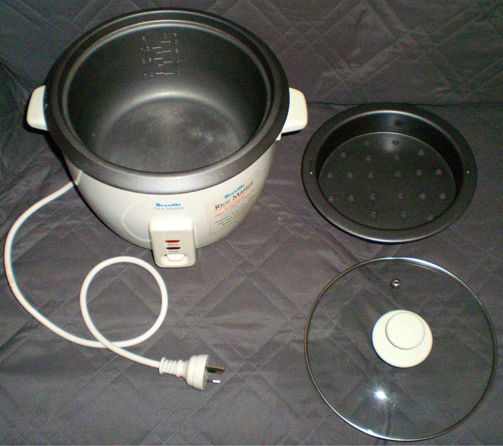 White Breville Rice Master RC12 Rice Cooker with 8 cup capacity