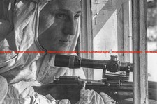 F061312 A Soviet sniper at a window on the Leningrad Front