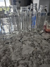 Vintage glass baby bottles with nursmatic hoods