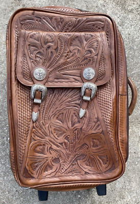 1998 American West tooled leather roller bag w/silver trim, original documents