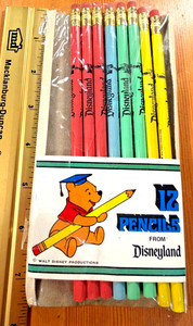 DISNEYLAND WINNIE THE POOH  PENCIL SET OPEN WITH EIGHT PENCILS TRUE VINTAGE