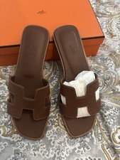 Herm s Women  s Oran Brown Leather H Logo Cutout Slide Sandals EU 37.5/US 7.5
