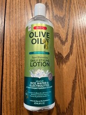New ORS OLIVE OIL MOISTURIZING HAIR LOTION  16 oz. bottle