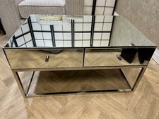 Mirrored coffee table with drawers