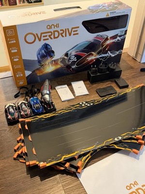 Anki Overdrive Starter Kit w/ 4 Cars X52 Truck Track Box Tested Complete