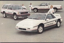 1984 Pontiac Fiero Indy 500 Pace Car Gmc Hauler Trucks Oversize Postcard 1984 Pontiac Fiero Indy 500 Pace Car Gmc Hauler Trucks Oversize Postcard