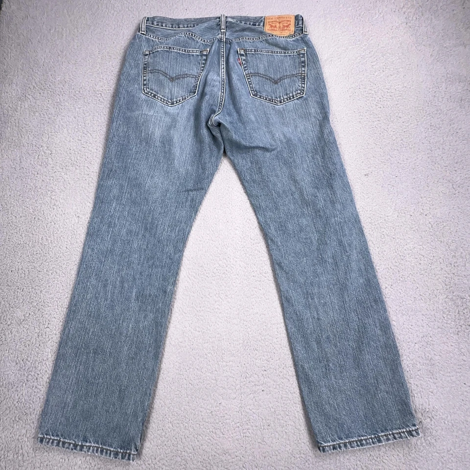 Pantalones de mezclilla Levis 569 para hombre 34x32 azul lavado claro sueltos rectos cremallera mosca lengüeta roja Foto 4 de 4