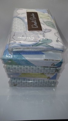 Dwell Studio Pack of 4 Fitted Crib Sheets.free 2 bib and burp set  included 