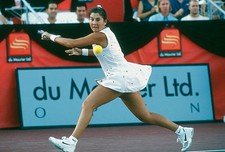 Monica Seles of Yugoslavia hits a return at a women's singles matc- Old Photo 11