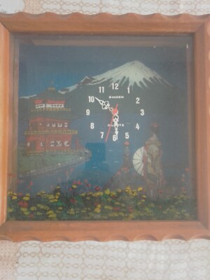 Relógio de parede Shizen madeira e vidro.
