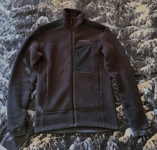 Norrona Trollveggen Warm3 Medium Jacket for Men in Phantom