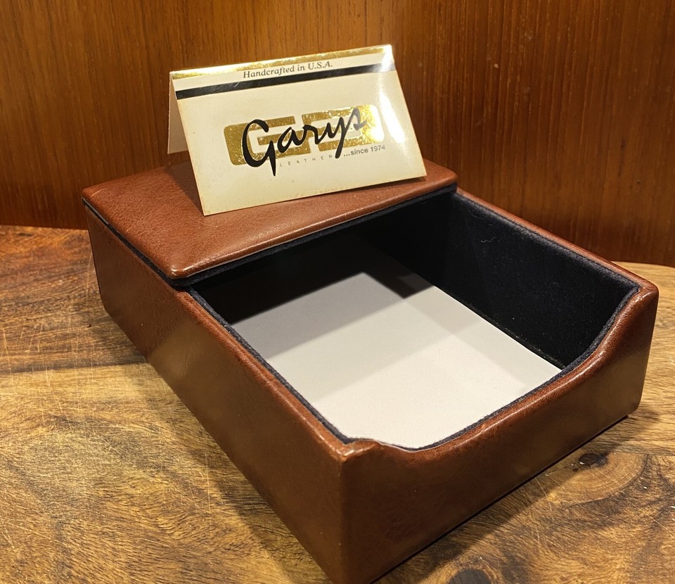 A genuine hand-stitched leather flip-top memo box — the kind of tactile, analog desk piece that money can't buy new anymore.