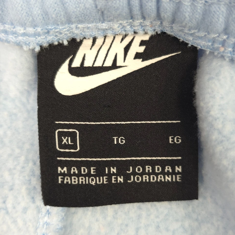 PANTALONES JOGGER NIKE AZUL CLARO POLAR PARA MUJER Talla XL BOLSILLOS CON CORDÓN pequeña mancha Foto 3 de 4