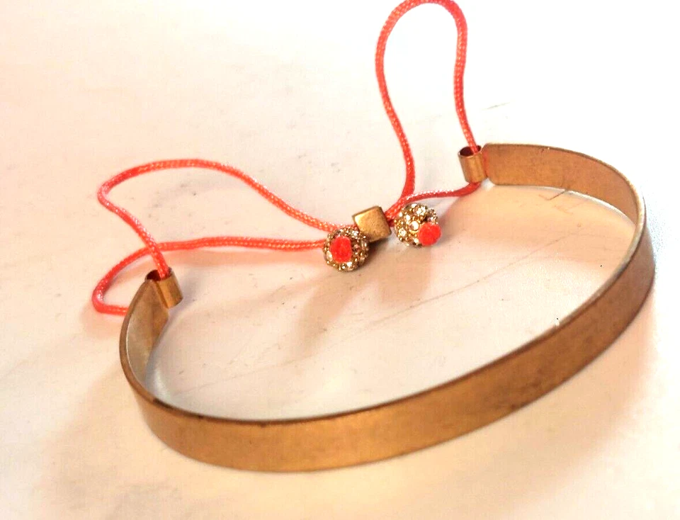 Brazalete J CREW Tono Dorado con Estrás y Cinta Rosa Foto 2 de 3