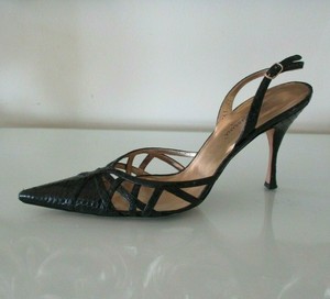 snakeskin pointed toe heels