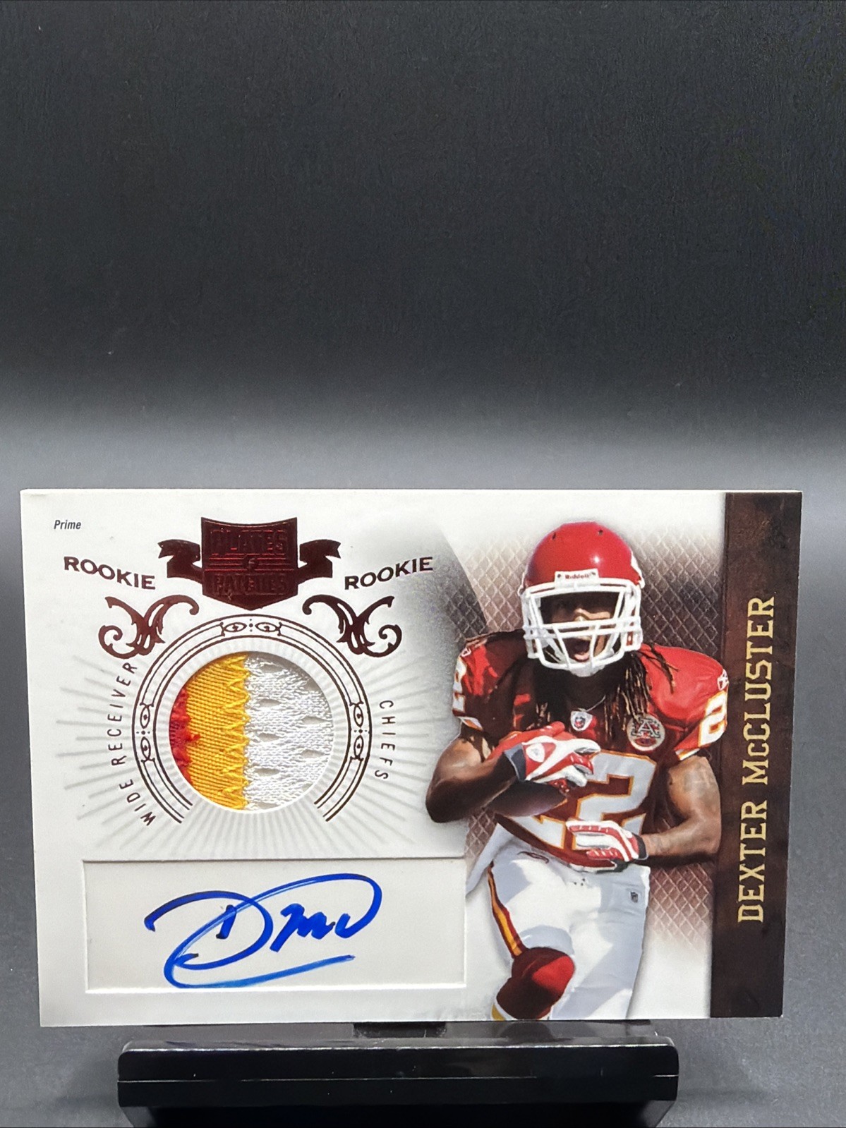 2010 Panini Plates & Patches Dexter McCluster /599 RC Auto Chiefs 3 Color Patch.