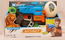 Zuru X-Shot Dino Attack Dino Striker Gun with 8 x Darts & Target Dino Egg