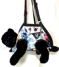 HAVING A HARD TIME CUTTING YOUR PET'S NAILS/EARS USE THIS MULTI-USE CARRIER 