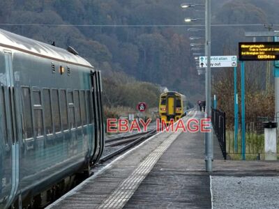 PHOTO  A 'FACE-OFF' AT DOVEY JUNCTION? ACTUALLY THE FAR TRAIN IS HEADING AWAY TO