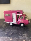 vintage 1970s pink pressed steel camper van toy by Tonka.