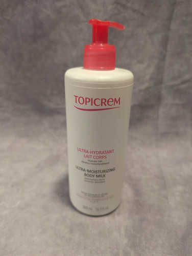 Topicrem Ultra feuchtigkeitsspendende Körpermilch 16,9oz (500ml) - Bild 1 von 3
