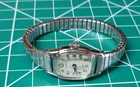 vintage Timex quartz watch silver-tone rectangular case & stretch band