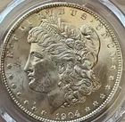 1904-O $1 Morgan Silver Dollar. Higher Grade. Slab Included.