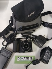 NIKON Coolpix E5000 5MP, charger, 2 x battery, USB AC adapter, memory card, bag