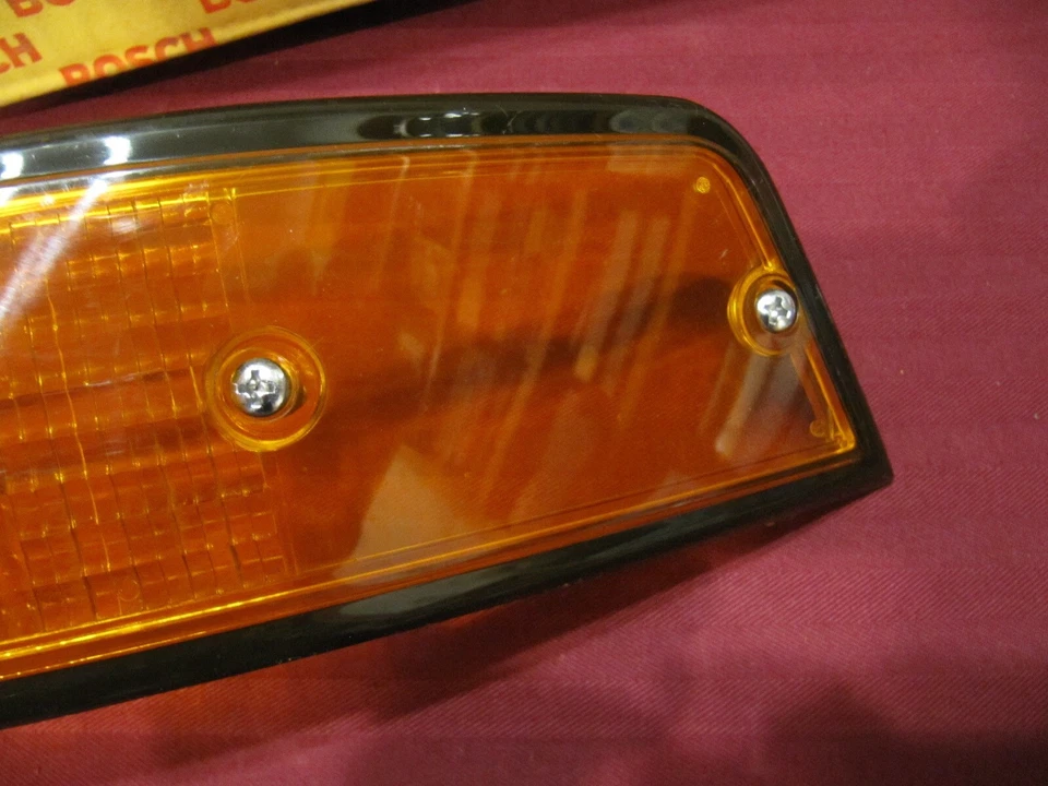 Lente señal de giro izquierda Porsche 911 1973 NOS Bosch Alemania 911 631 947 00 Foto 2 de 4