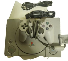 Sony PlayStation 1 Video Game Console - Gray bundle with 7 games.
