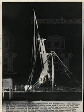 1959 Press Photo Night view of Strong Arm rocket before its launch, Virginia