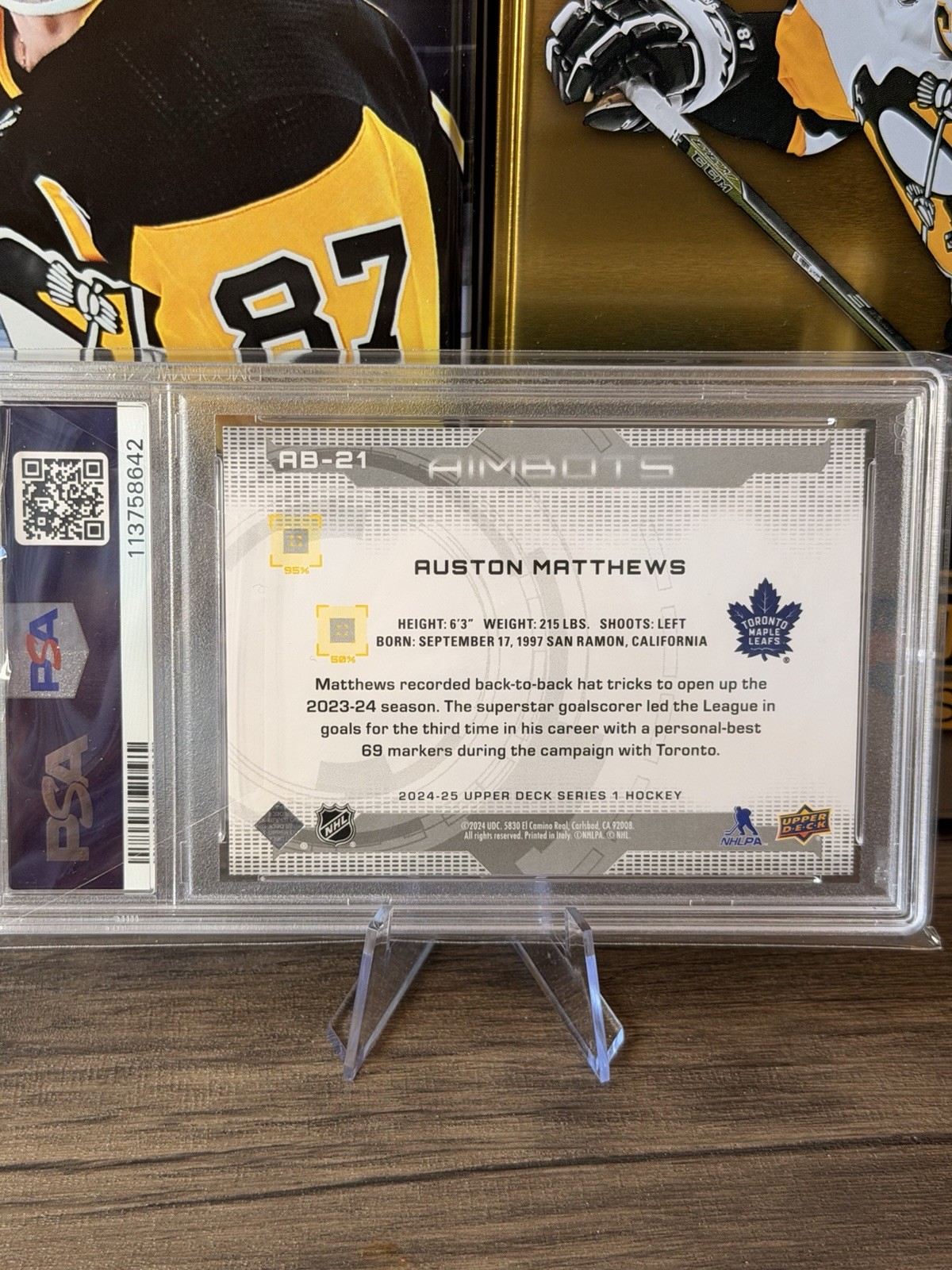 2024-25 Upper Deck Aimbot Speckle Auston Matthews #AB-21 / PSA 9 view 2