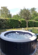  Spa gonflable Intex PureSpa 4 places - Gris.État neuf (servi 15 jours)