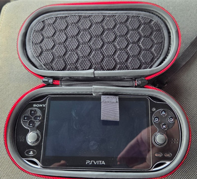 Sony PS Vita OLED pch-1011 with: 400gb +32g storage + Carrying Case + Charger