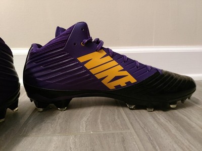 purple and yellow football cleats