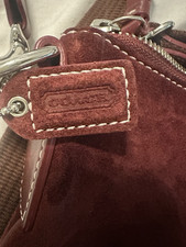 Coach Burgundy Suede Shoulder Bag with Brown Strap and Stitching Accents