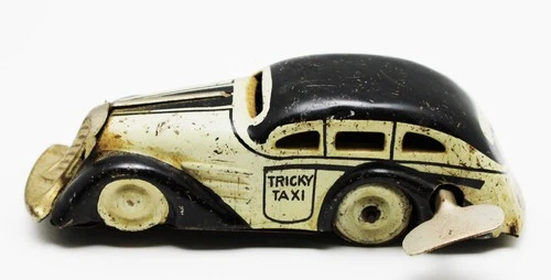 Vintage 1930’s Marx Tin Litho Wind Up 4.5" Beige & Black Tricky (With Key)