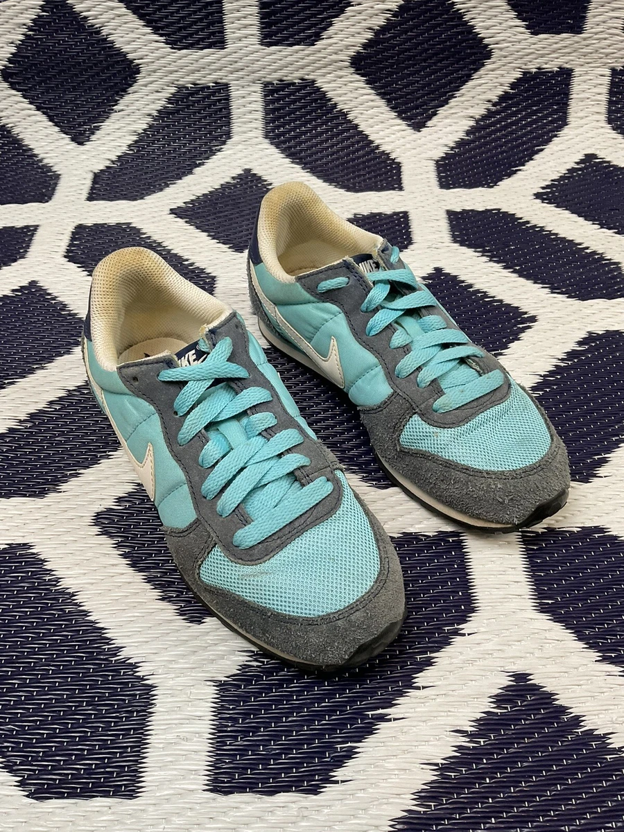 Wmns top nike genicco