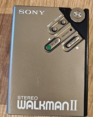 sony walkman wm-2 ,with beltclip, signs of wear, works but read discription