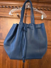 Anthropologie NWOT vegan faux leather blue bucket drawstring bag