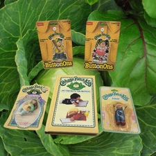 Cabbage Patch Kids Vintage Lot- Button Ons, Figurine, Erase, Drawing Book- Cute!