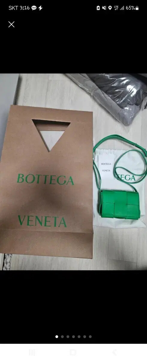 Bottega Veneta mini cassette crossbody bag in premium leather